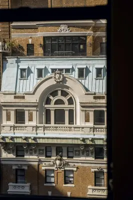 a view of a building from a window at Newly Renovated Rooms at Club Quarters Hotel Times Square, New York in New York