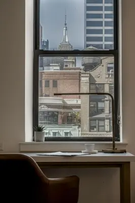 a window with a view of a city at Newly Renovated Rooms at Club Quarters Hotel Times Square, New York in New York