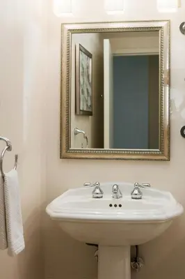 a bathroom with a sink and a mirror at Renaissance Newark Airport Hotel in Elizabeth