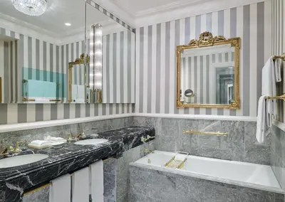 a bathroom with two sinks and a large mirror at 5th & 55th Residence Club in New York