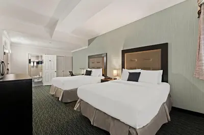 two beds in a hotel room with two at Quality Inn Philadelphia Center City in Philadelphia