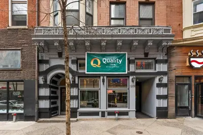 a building with a sign on the front of it at Quality Inn Philadelphia Center City in Philadelphia