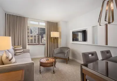 a living room with a couch and a chair at Club Wyndham Midtown 45 in New York