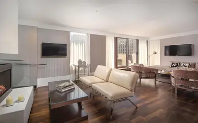 a living room with a couch and a fireplace at Club Wyndham Midtown 45 in New York