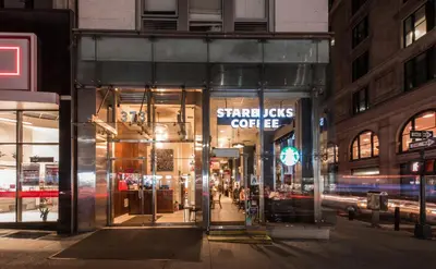 a store on a city street at night at U Hotel Fifth Avenue, Empire State Building in New York