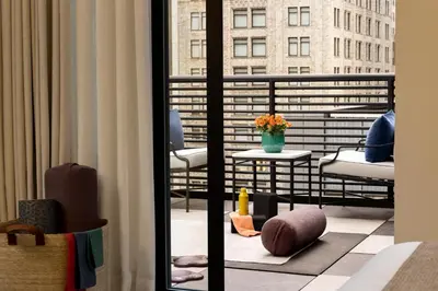 a balcony with a view of a building at The Chemists Club Hotel in New York