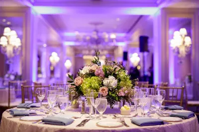 a table with a vase of flowers on it at Renaissance Philadelphia Downtown Hotel in Philadelphia