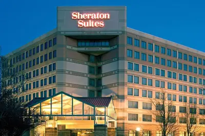 a building with a sheraton suites sign on it at Sheraton Suites Philadelphia Airport in Philadelphia