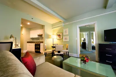 a living room with a couch and a table at Hotel Beacon in New York