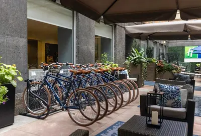 a row of bikes parked in front of a building at Holiday Inn Express NYC Chelsea - NoMad Area by IHG in New York