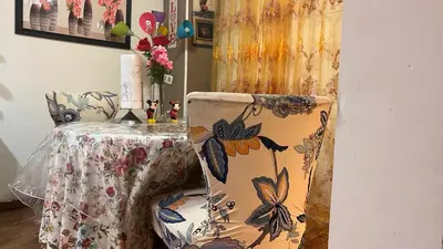 a table with a chair and a table with a table cloth at Garden Suite 30 Mins to NYC, Mins to EWR, Prudential Center, NJPACK in Belleville