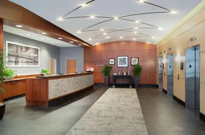 a lobby of a hospital with a reception desk and a lobby at Hampton Inn Philadelphia Center City-Convention Center in Philadelphia