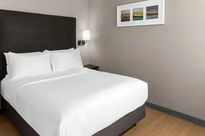 a large white bed in a hotel room at Solita Soho Hotel in New York