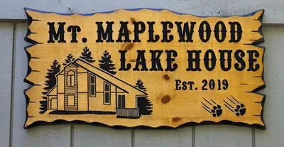 a sign that says mr marvellous lake house at Mt. Maplewood Lake House in Blakeslee
