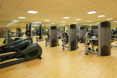 a gym with lots of treadmills and machines at Sheraton Bucks County Langhorne in Langhorne