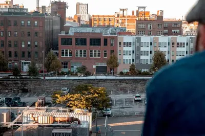 a view of a city with cars and buildings at Poor Richard Studio at Kestrel Hotel in Philadelphia