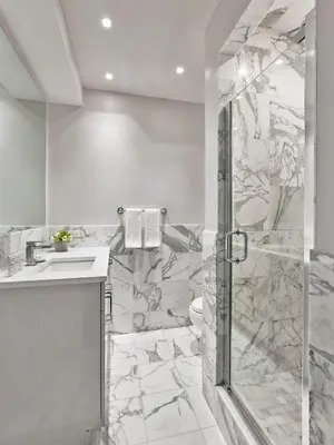 a bathroom with a shower and a sink at AKA Rittenhouse Square in Philadelphia