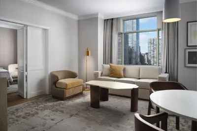 a living room with a couch and a table at The Westin Philadelphia in Philadelphia