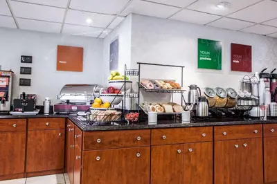 a kitchen with a bunch of food on a counter at Comfort Inn Feasterville - Trevose in Trevose