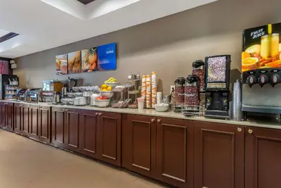 a buffet line in a fast food restaurant at Comfort Suites Newark - Harrison in Newark
