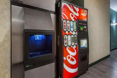 a coca cola vending machine next to a soda machine at Quality Inn Montgomeryville-Philadelphia in Montgomeryville