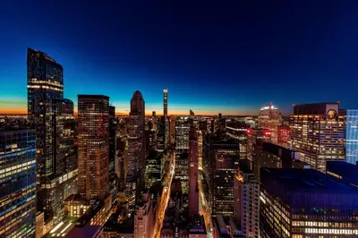 a view of a city skyline at night at Residence Inn by Marriott New York Manhattan/Central Park in New York