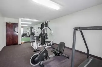 a gym with cardio equipment in a room at Sleep Inn Cinnaminson - Philadelphia East in Cinnaminson