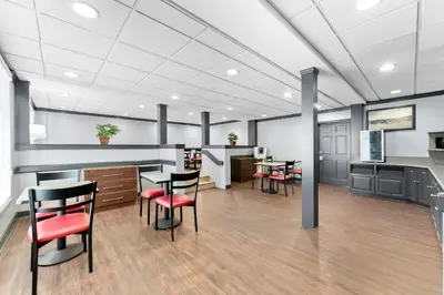 an office with tables and chairs in a room at Red Roof Inn Lancaster in Lancaster
