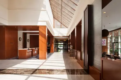 a hallway in a building with a lobby at The Westin Princeton at Forrestal Village in Princeton