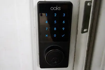 a remote control with the words owls on it at A Modern Apt close to downtown in Lancaster