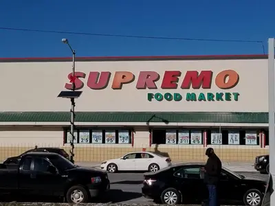 a supermarket with cars parked in a parking lot at 500 Estates LLC in Irvington