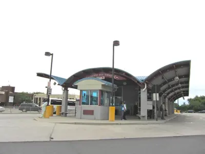 a gas station with people standing at at 500 Estates LLC in Irvington