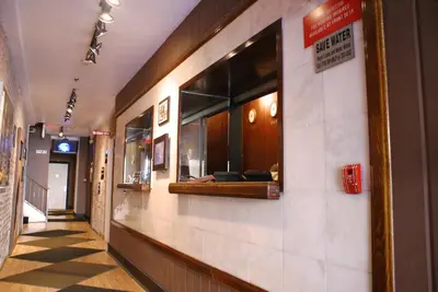 a hallway of a building with a waiting room at Off SoHo Suites Hotel in New York