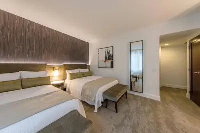 a hotel room with two beds and a window at Marriott Vacation Club®, New York City  in New York