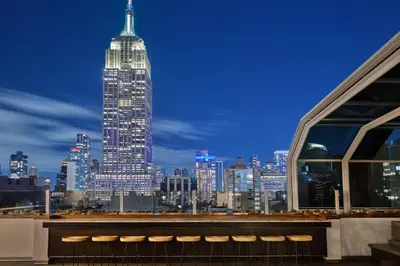 a view of the empire state building at night at Marriott Vacation Club®, New York City  in New York
