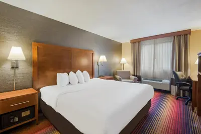a large white bed in a hotel room at Red Roof Inn Fairfield in Fairfield