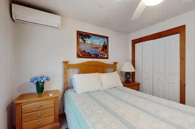 a bedroom with a bed and a white door at Northridge 482 in Tannersville