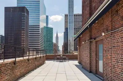 a balcony with a view of a city skyline at Hotel 57 in New York
