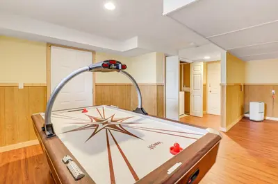 a ping pong table in a room at Pocono Retreat Access to Community Lake and Beach! in Albrightsville
