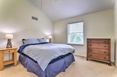 a bedroom with a bed and a dresser and a window at Private Dog-Friendly Home 3 Mi to Elk Mountain in Union Dale