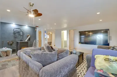 a living room with two couches and a tv at Cozy Pennsylvania Home with Pool Table and Pool Access in Effort