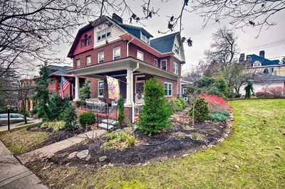 a large house with a garden in front of it at 2 Mi to Reading Pagoda Spacious Home with Deck! in Reading
