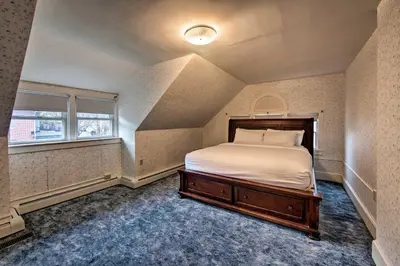 a bedroom with a bed and a window at 2 Mi to Reading Pagoda Spacious Home with Deck! in Reading