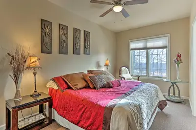 a bedroom with a bed and a ceiling fan at Townhome with Grill Less Than 1 Mi to Big Boulder Mountain in Lake Harmony