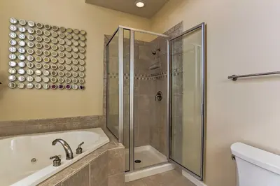 a bathroom with a shower and a bath tub at Townhome with Grill Less Than 1 Mi to Big Boulder Mountain in Lake Harmony