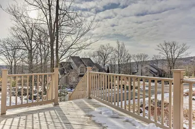 a wooden walkway with snow on a house at Townhome with Grill Less Than 1 Mi to Big Boulder Mountain in Lake Harmony