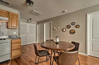 a kitchen and dining room with a table and chairs at Modern Elizabeth Apt by Dining and NYC Transit! in Elizabeth