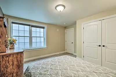 a bedroom with a bed and a window at Family Home with WiFi, 14 Mi to Dutch Wonderland! in New Holland