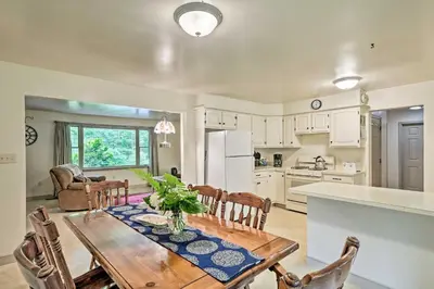 a kitchen and dining room with a table and chairs at Family Home with WiFi, 14 Mi to Dutch Wonderland! in New Holland