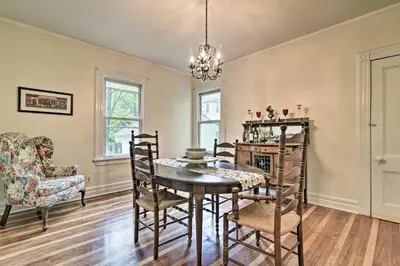 a dining room with a table and chairs at Millburn House with Deck - Walk to NYC Transit! in Millburn